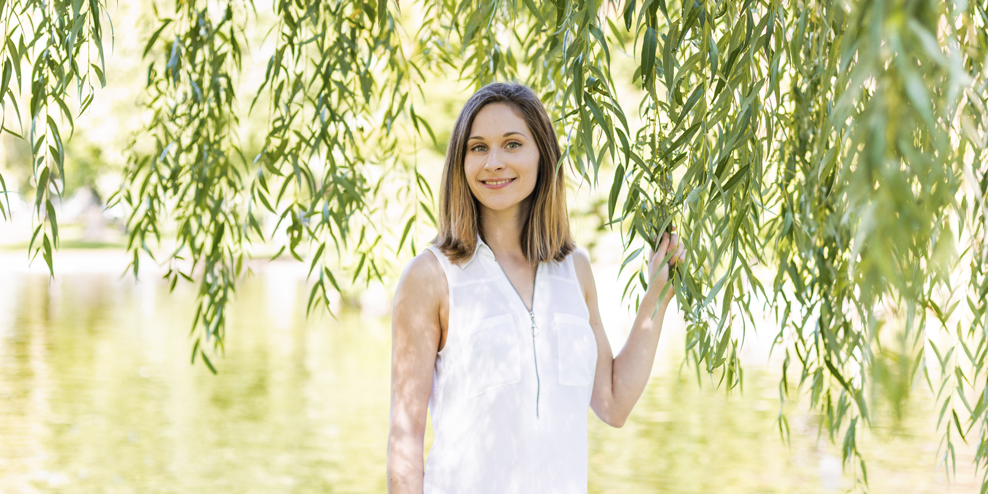 Picture of Dr. Kara Larson with a white blouse and a light green nature background. Work with Dr. Kara Larson and her private and group coaching sessions designed to help high performers increase productivity, and thrive with neuroscience and holistic wellness